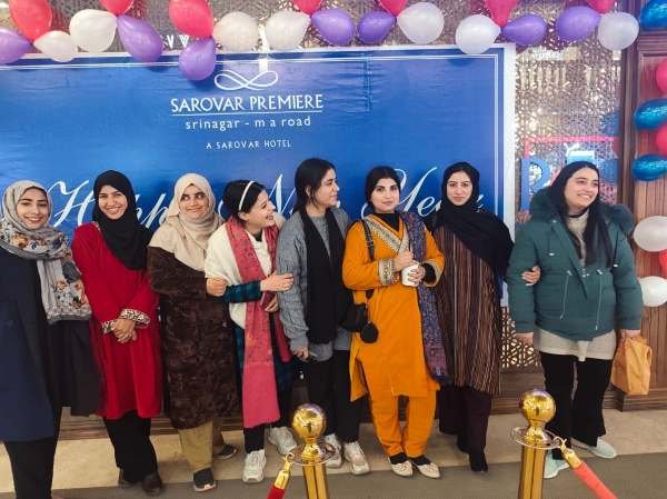 Local driver and travel support team assisting travelers in Kashmir