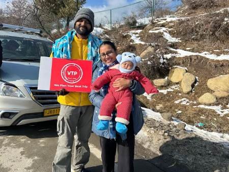 Tourists enjoying Gulmarg snow tour with Valley Trip Planner