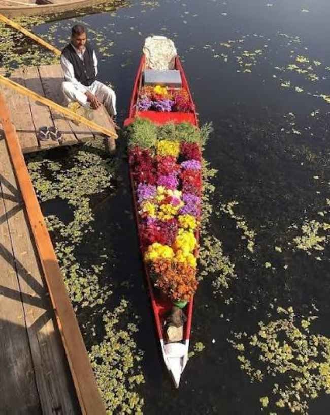 Dal Lake houseboat night on a Srinagar package from Pune